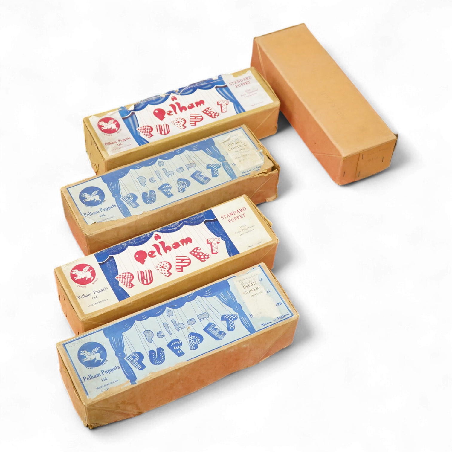 Five Pelham Puppets, four in boxes, including; Prince Charming, a Type SL Fairy Godmother, a Cowboy, Wags the Dog, and Cinderella (unboxed)